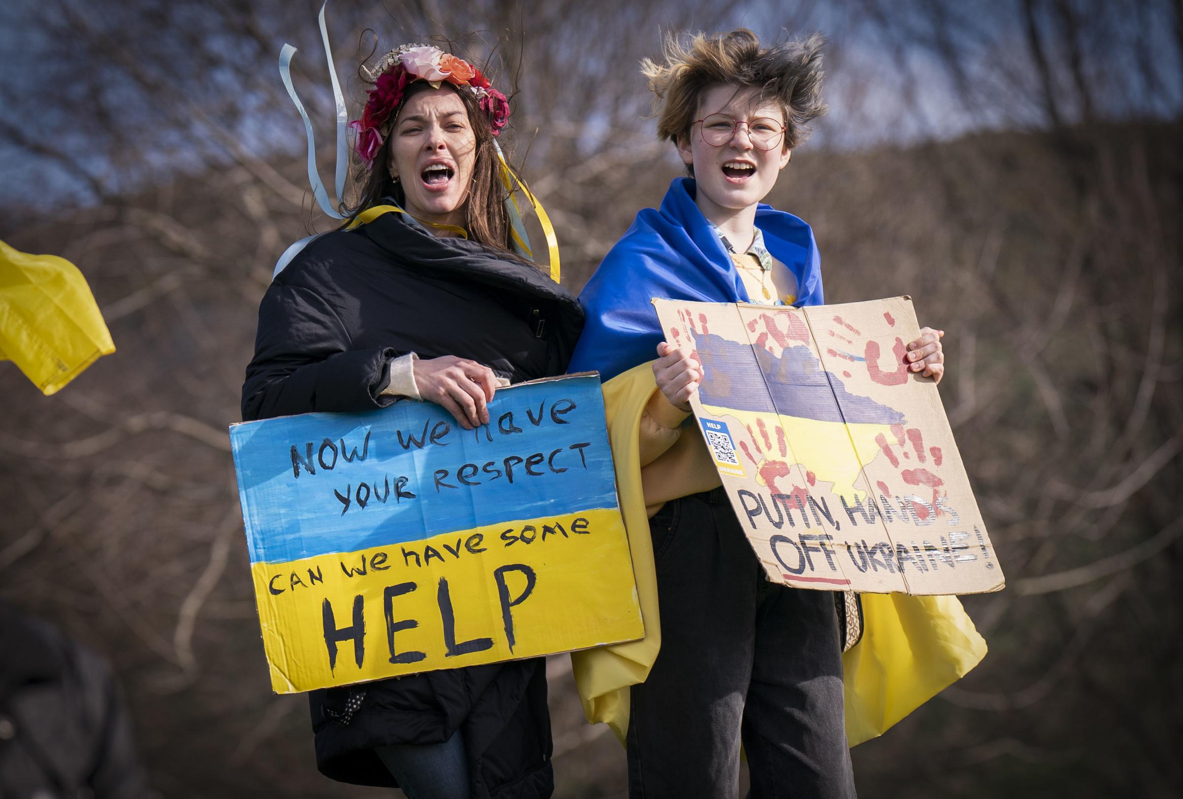 People take part in the Scotland Stands with Ukraine peace rally, outside the Scottish Parliament in Edinburgh, following the Russian invasion of Ukraine. Picture date: Thursday March 17, 2022. PA Photo. See PA story POLITICS Ukraine. Photo credit should